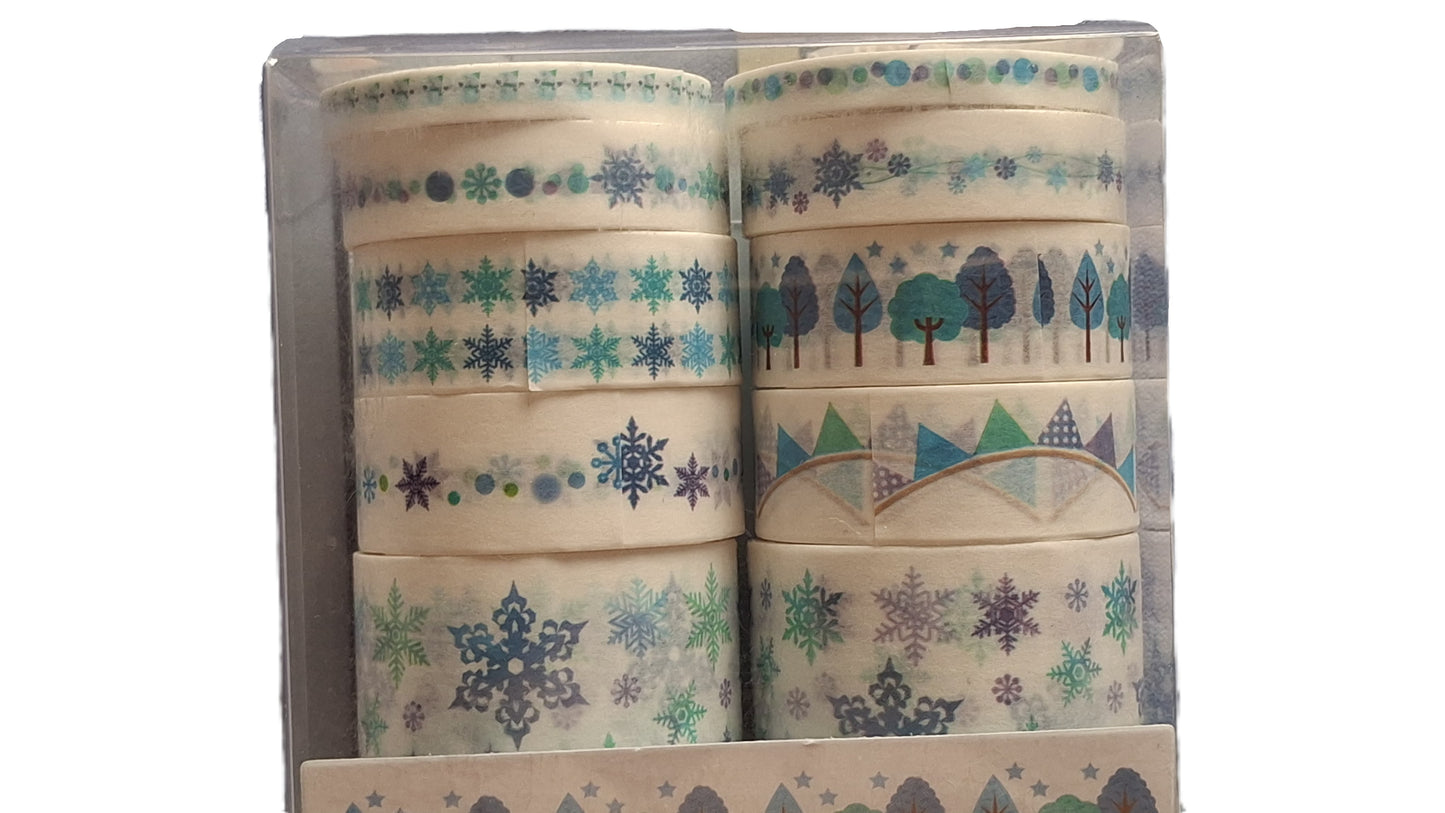 Set of washi tape rolls with nature-themed designs in a box