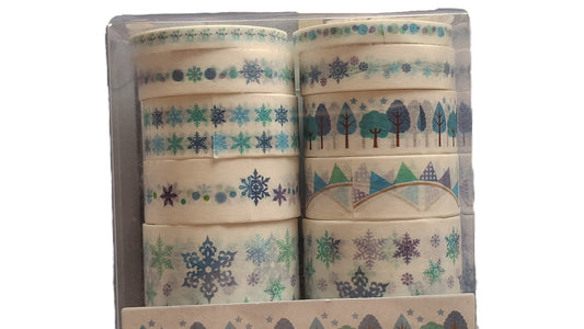 Set of washi tape rolls with nature-themed designs in a box